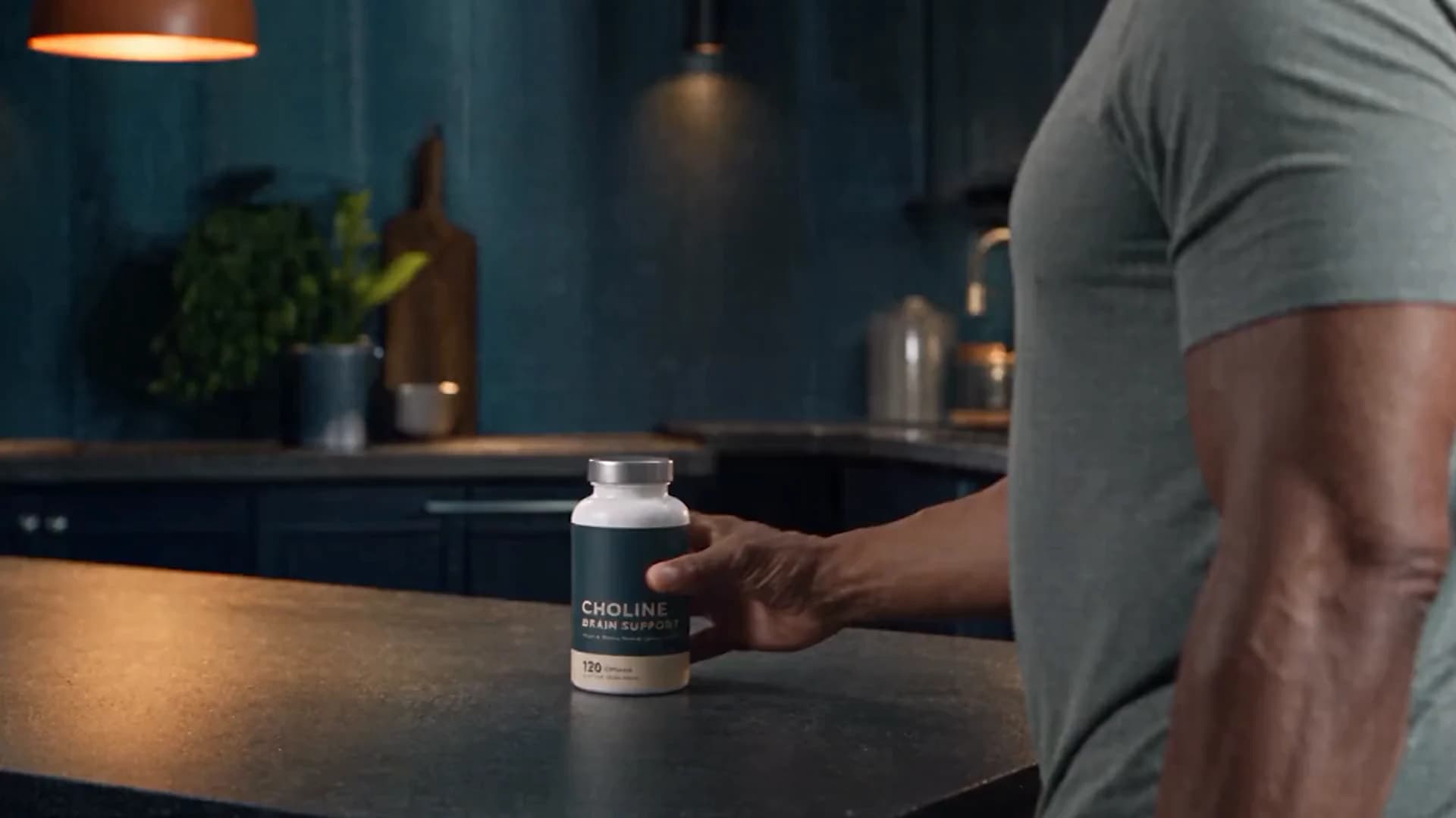 A hand setting a Choline Brain Support bottle on a kitchen counter, about to scan its label with Omnis Body.
